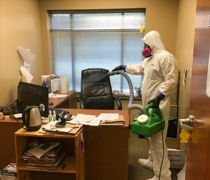 SERVPRO technician fogging and cleaning an office in Nashville