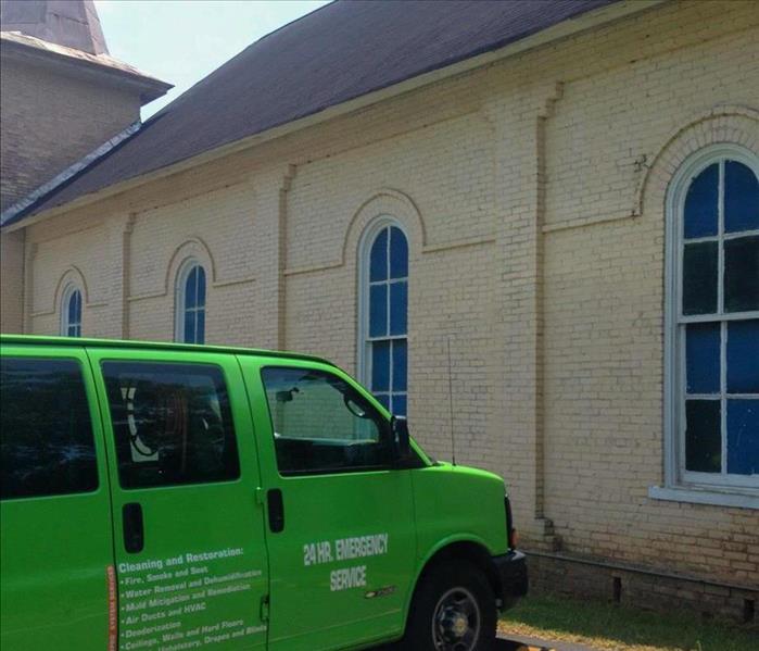 SERVPRO van parked in front of a Nashville, TN church struck by storm damage